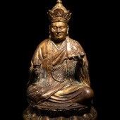A Tibetan Gilt Bronze Figure o
