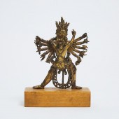 A Tibetan Gilt Bronze Figure o