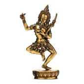 A TIBETAN GILT BRONZE SCULPTUR