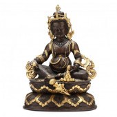 A TIBETAN GILT BRONZE SCULPTUR
