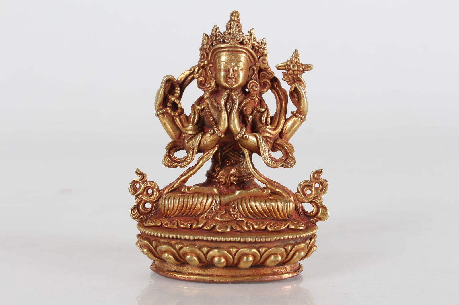 A TIBETAN GILT RELIGIOUS FORTUNE