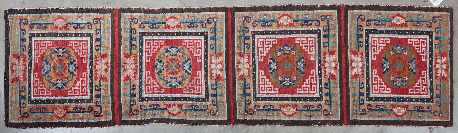 A TIBETAN RUG, 20TH CENTURYA
