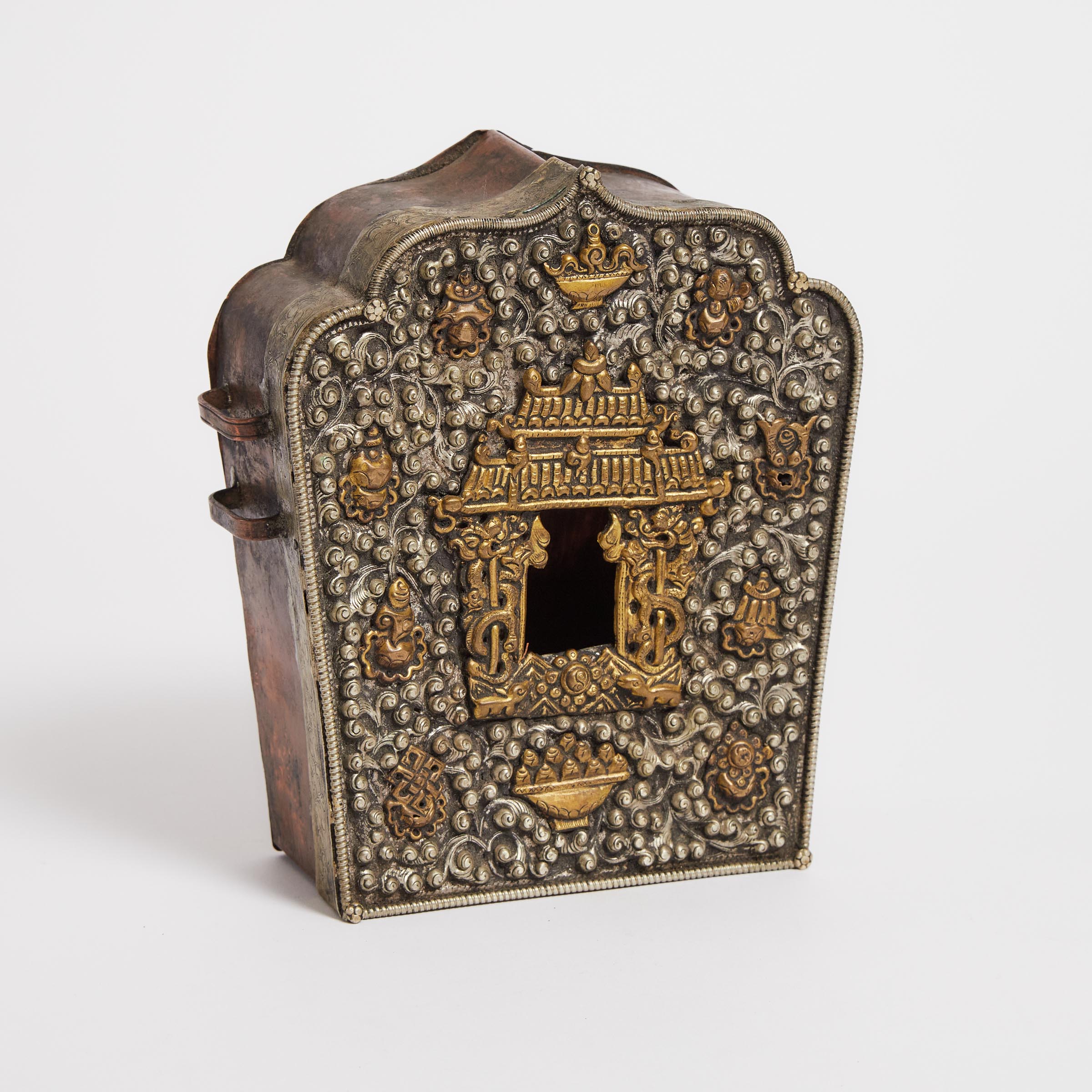 A Tibetan Silver and Brass Amulet