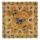 A TIBETAN YELLOW GROUND RUG WI