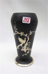 A TIFFIN BLACK SATIN PEDESTAL