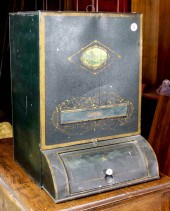 A TIN CANNISTER A tin canniste