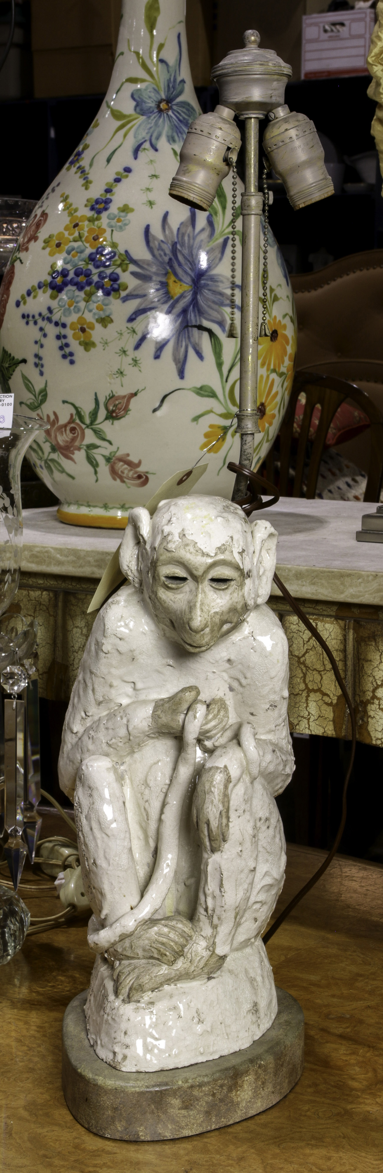 A TIN GLAZED MONKEY FORM