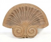 A TINTED COMPOSITION SHELL FOR