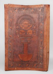 A tooled leather Aztec style c