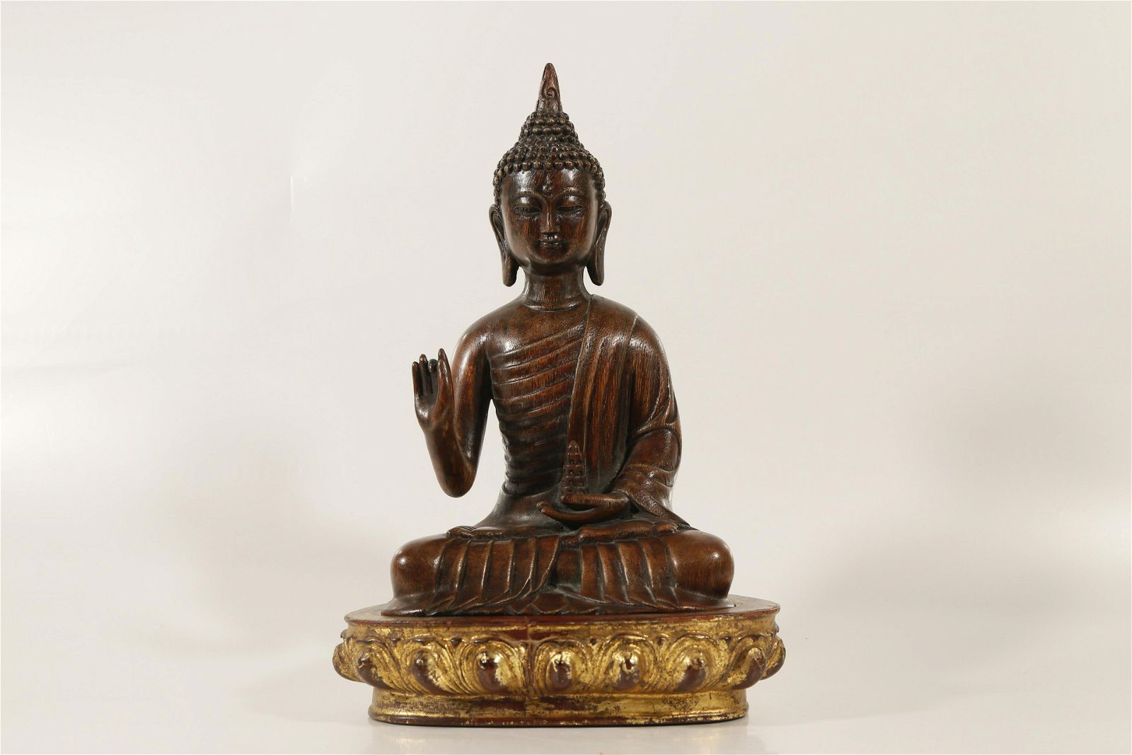 A TOP GOLD-PAINTED EAGLEWOOD FIGURE