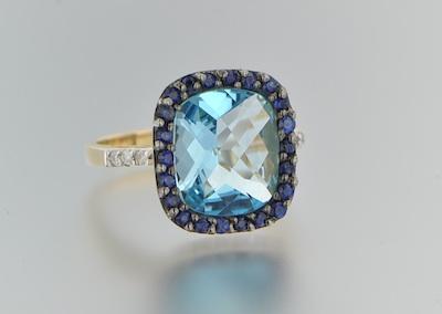 A Topaz, Spinel and Diamond Ring