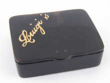 A tortoiseshell vesta case with