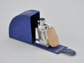 A Traveling Atomizer Marked De