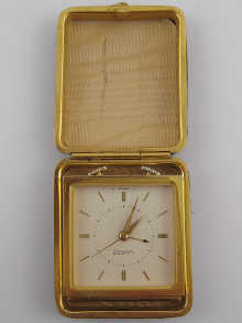 A travelling clock by Luxor dial