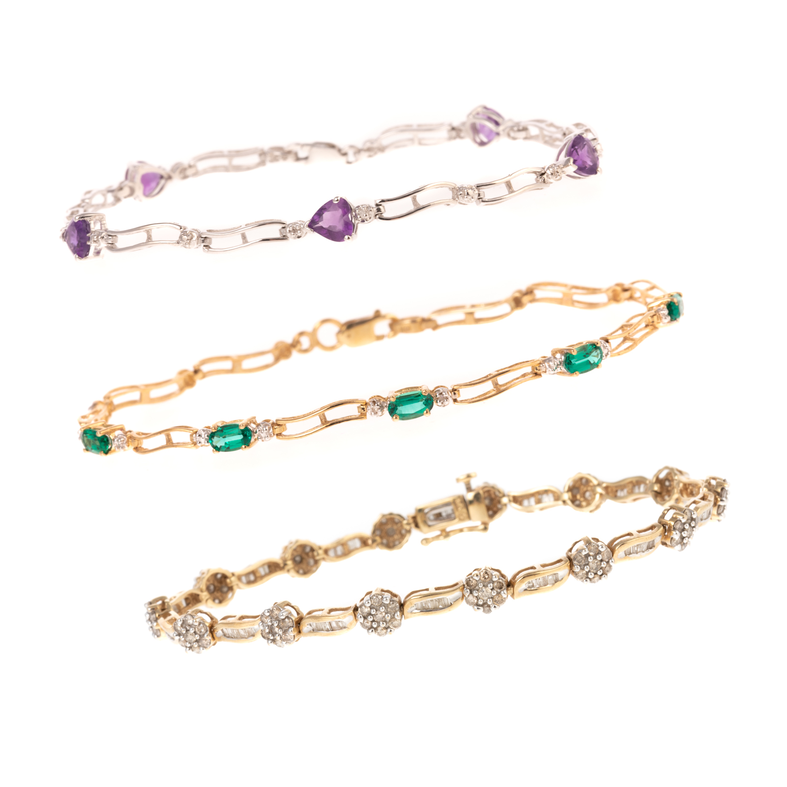 A TRIO OF 10K GOLD GEMSTONE