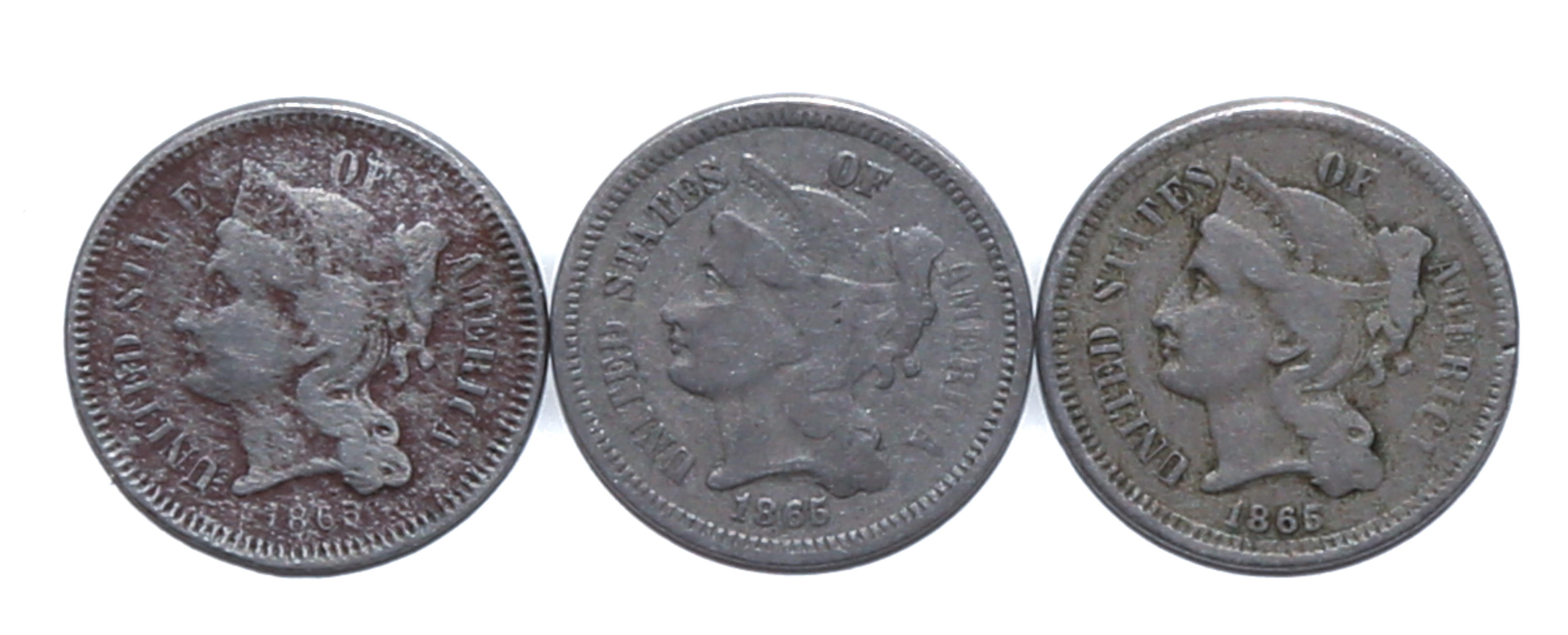 A TRIO OF 1865 THREE CENT NICKEL