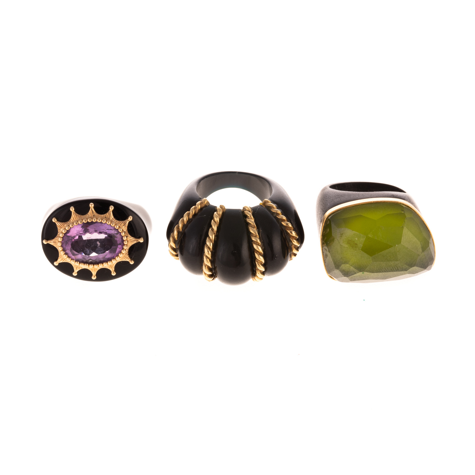 A TRIO OF BLACK RINGS WITH 14K