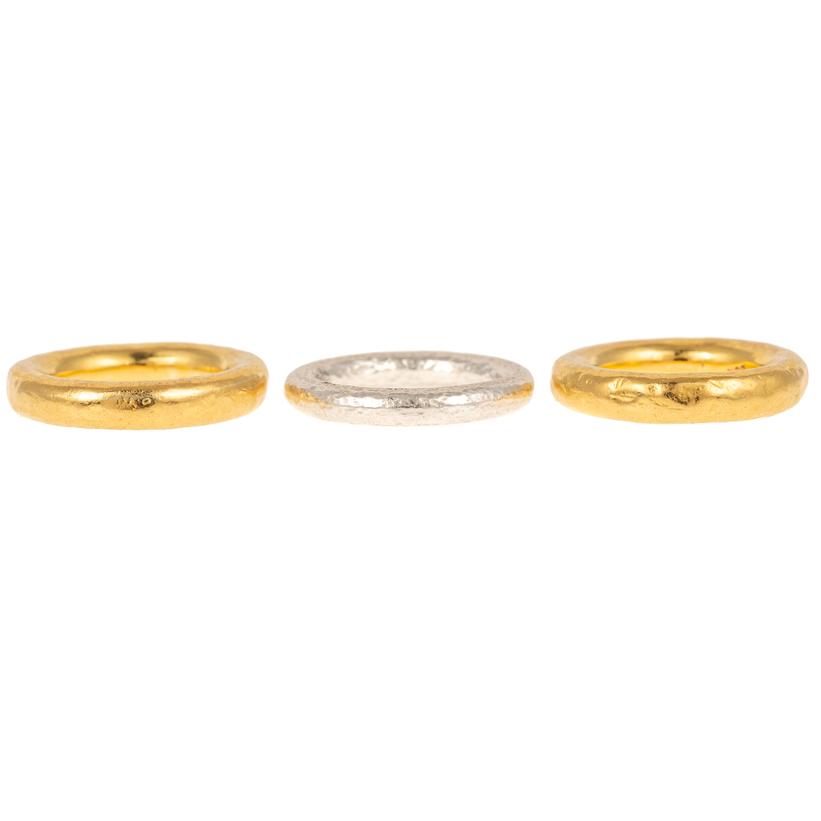 A TRIO OF HAMMERED FINISH BANDS