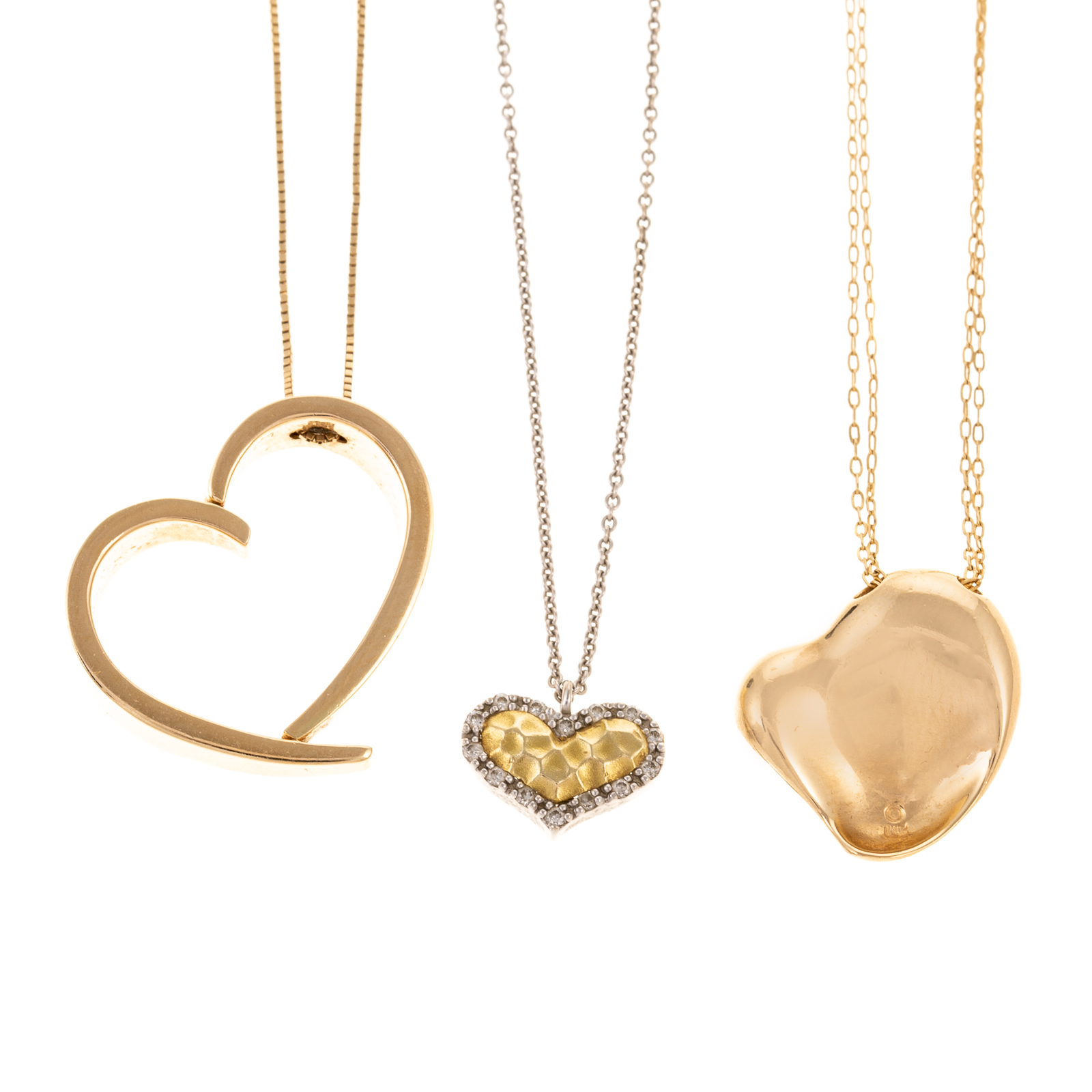 A TRIO OF HEART PENDANTS IN 14K