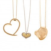A TRIO OF HEART PENDANTS IN 14