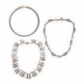 A TRIO OF STERLING SILVER NECK