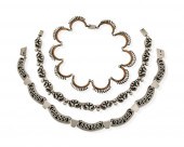 A TRIO OF VICTORIA SILVER NECK