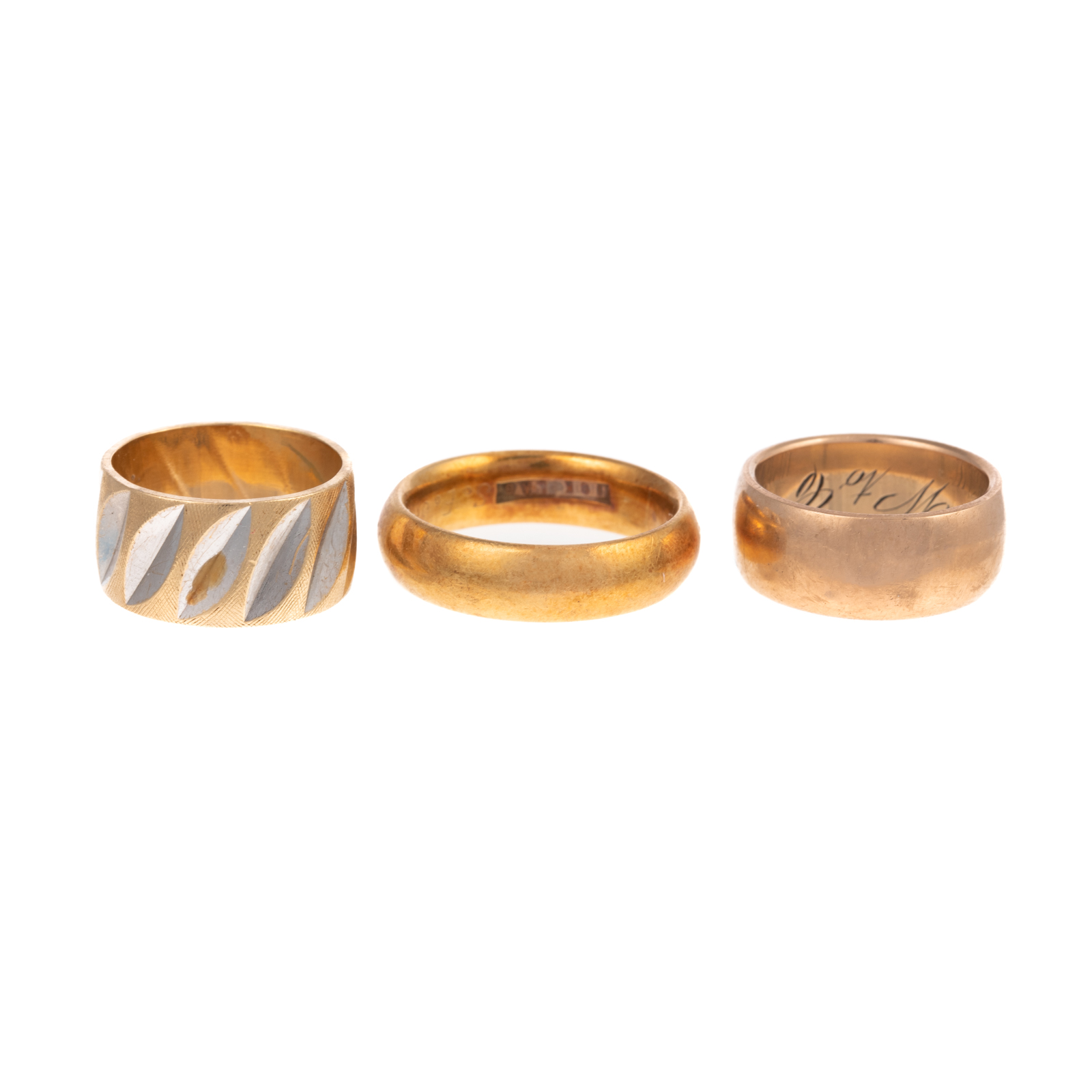 A TRIO OF VINTAGE GOLD BANDS IN 18K