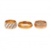 A TRIO OF VINTAGE GOLD BANDS I