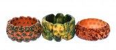 A TRIO OF WIDE BAKELITE BANGLE
