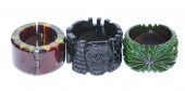 A TRIO OF WIDE BLACK, GREEN &