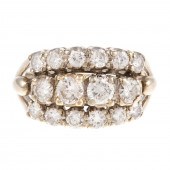 A TRIPLE ROW DIAMOND BAND IN 1