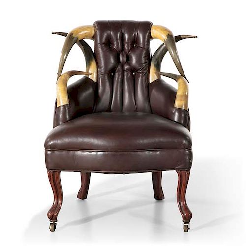 A TUFTED LEATHER AND HORN CHILD'S