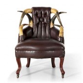 A TUFTED LEATHER AND HORN CHIL