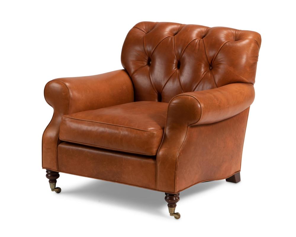 A TUFTED LEATHER CLUB ARMCHAIRA