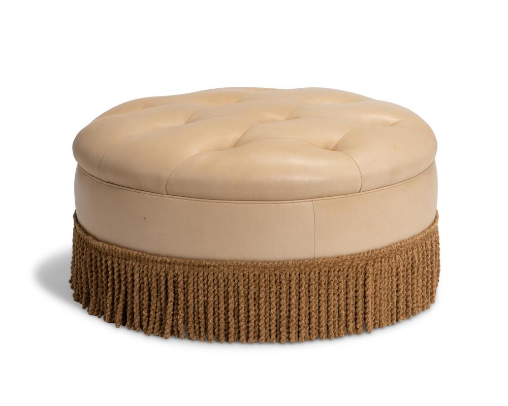 A TUFTED LEATHER POUF CUSHIONA