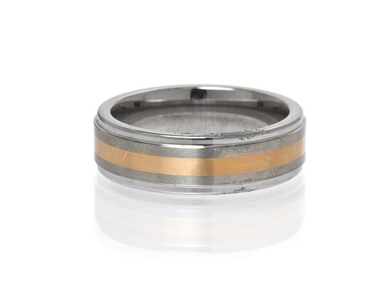 * A Tungsten Carbide and 18 Karat