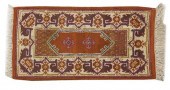 A Tunisian Wool Mat having a c