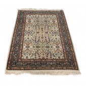 A TURKISH HEREKE CARPET A Turk
