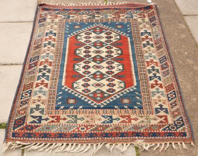 A Turkish rug, 165cm x 103cm