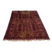A TURKOMAN TEKKE CARPET A Turk