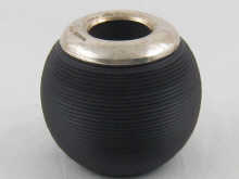 A turned ebony match holder with