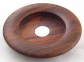 A turned walnut bottle coaster
