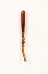 A turned wood and leather wrap