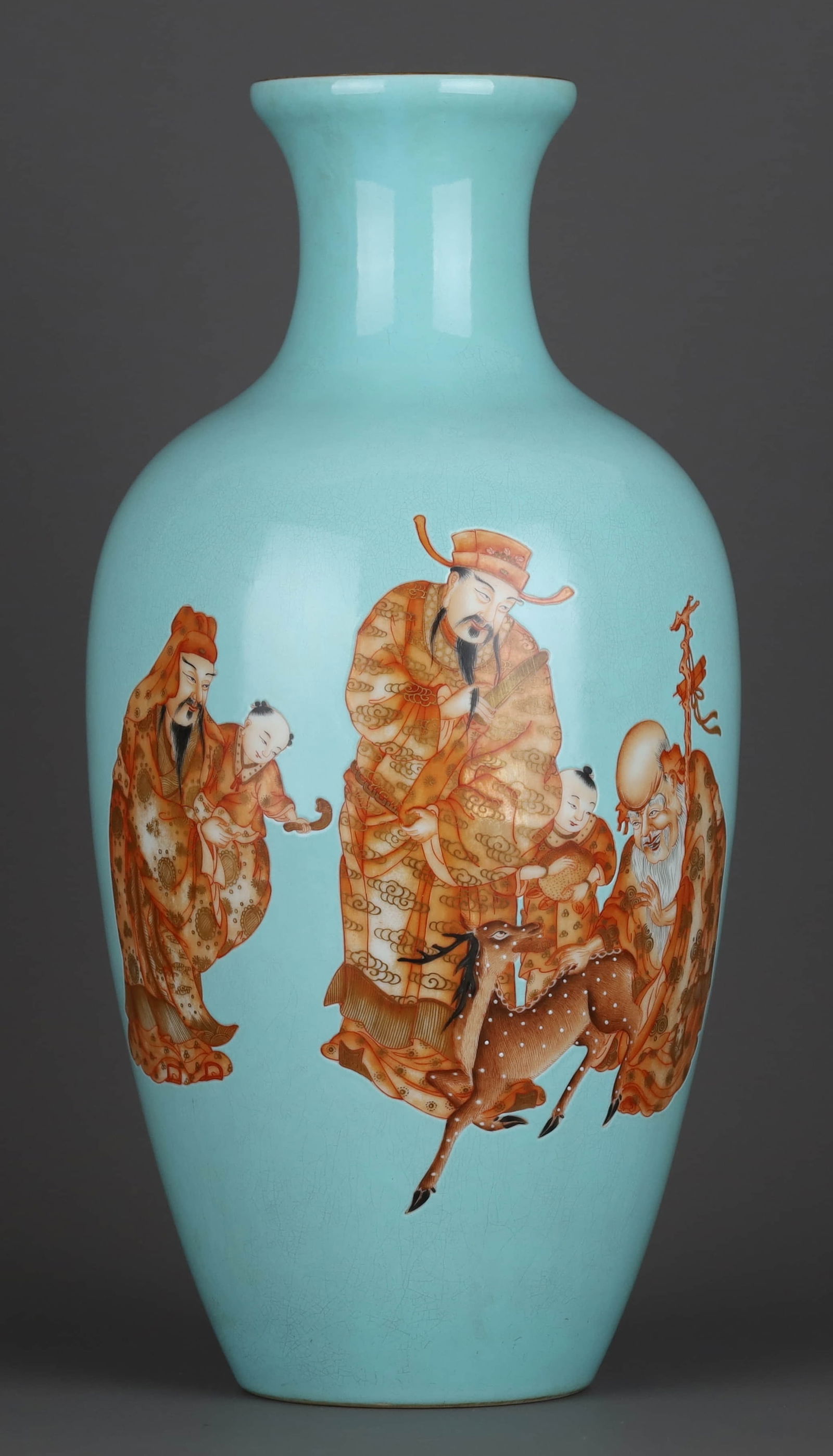 A TURQUOISE-GREEN GLAZED AND