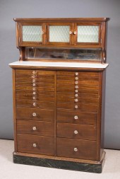 A TWENTY-TWO DRAWER MAHOGANY D