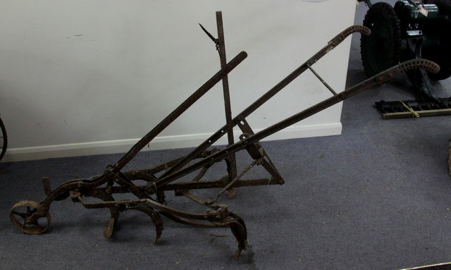 A two-handled five furrow harrow