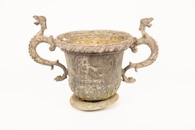 A two-handled lead garden urn, 43cm
