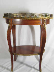 A two tier galleried table with