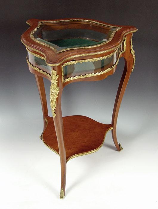 A UNIQUE FRENCH TRIANGULAR LIFT TOP