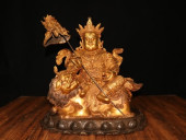 A VAISRAVANA STATUE<br>A VAISR